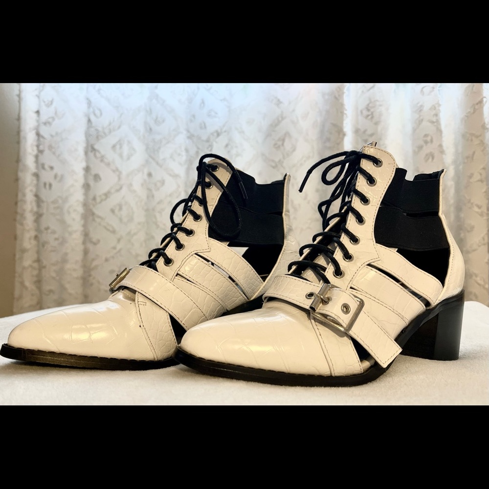 Dolls Kill “QUARTZ WANDERLUSTIN' CUT OUT BOOTS”